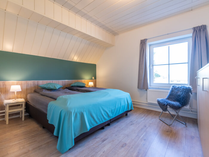 Groepsaccommodatie in Wellerlooi (Limburg) voor 14 personen met 5 slaapkamers en 3 badkamers.