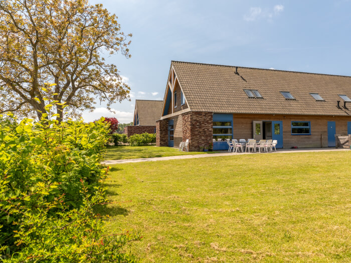 Groepsaccommodatie in Twello (Gelderland) voor 10 personen met 5 slaapkamers en 3 badkamers.